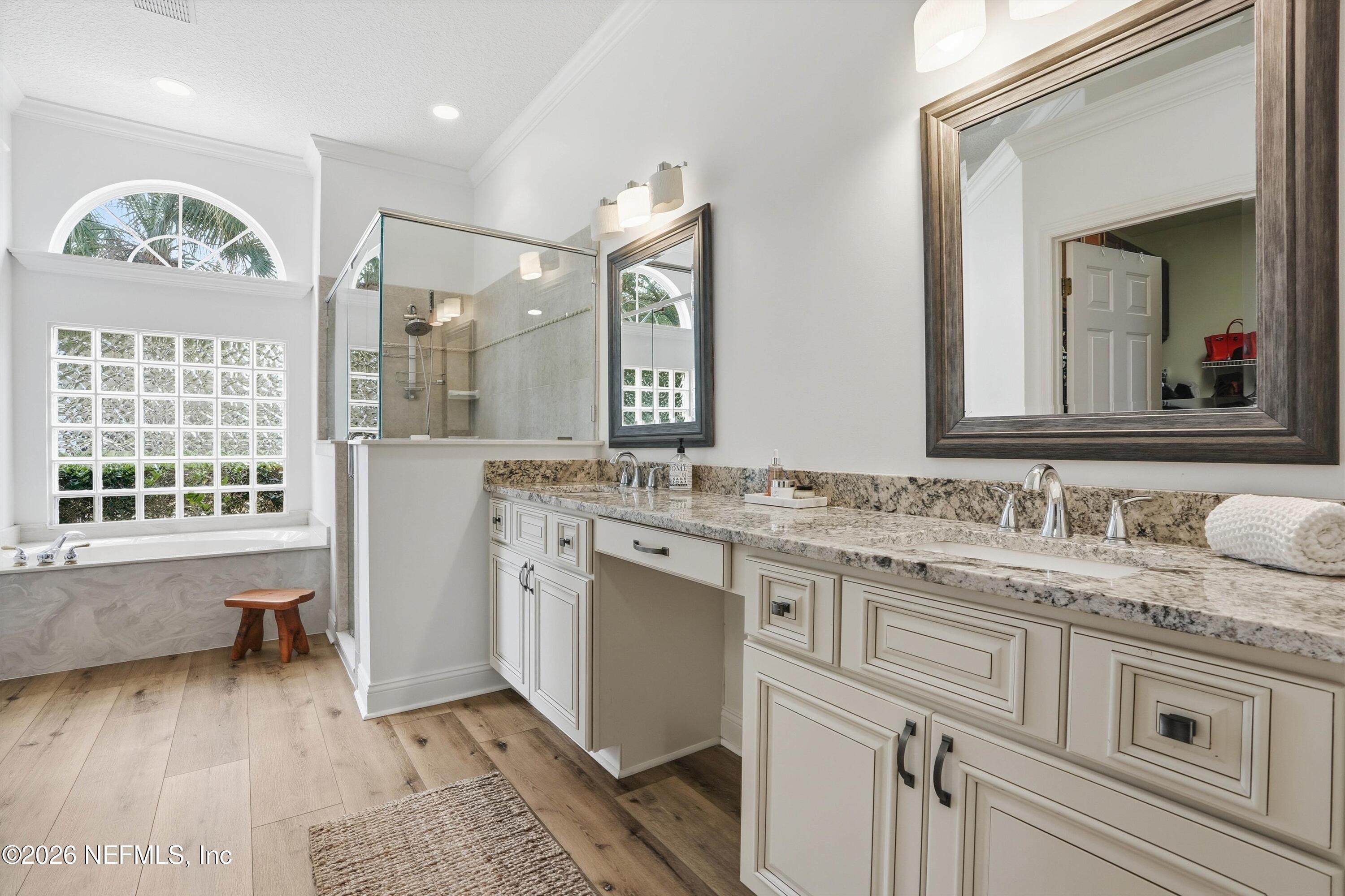628 Pelham Road St. Augustine, FL 32092 - Photo 19 of 56 a bathroom with a sink and a mirror