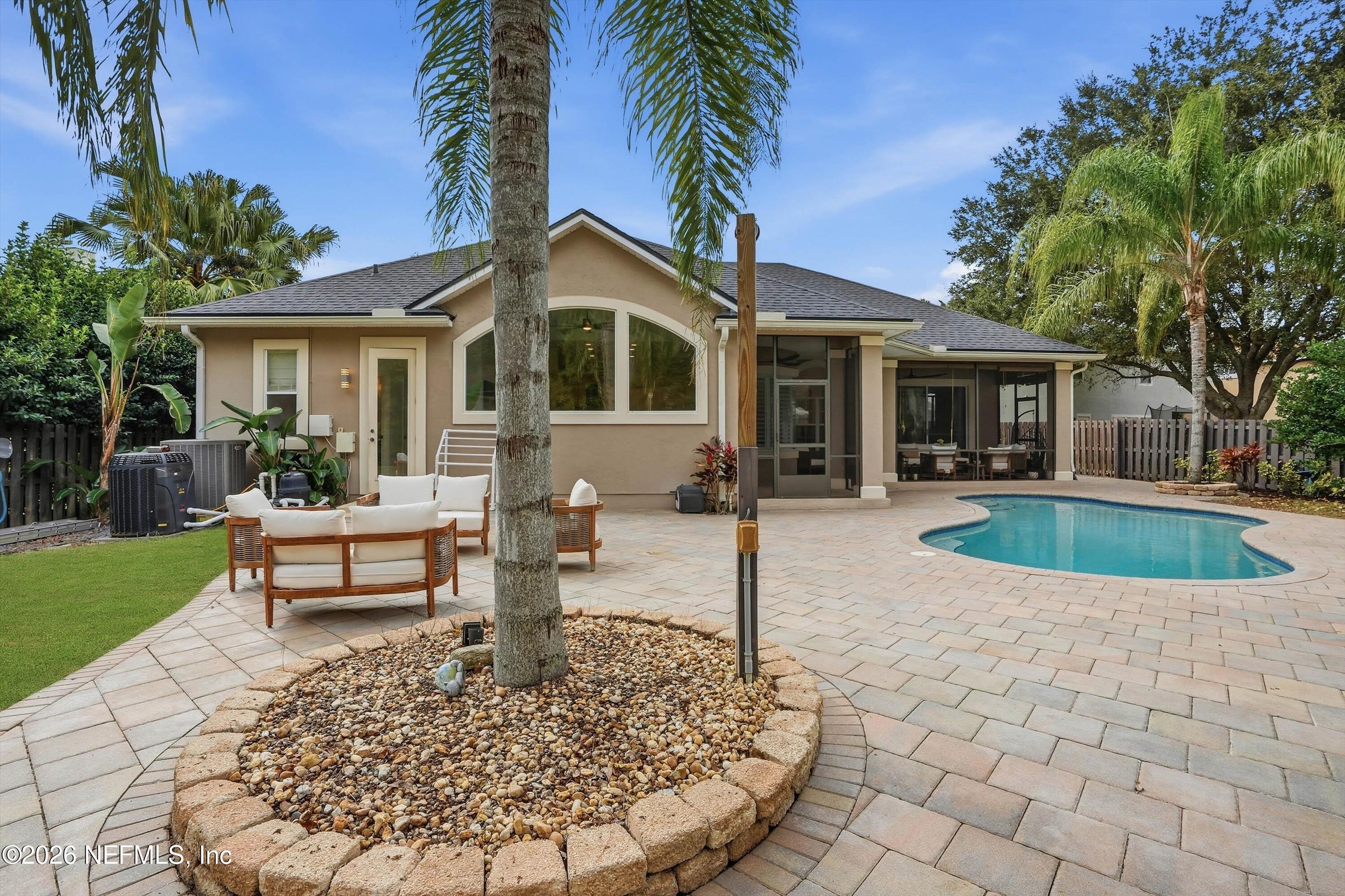 628 Pelham Road St. Augustine, FL 32092 - Photo 39 of 56 a view of a house with a swimming pool
