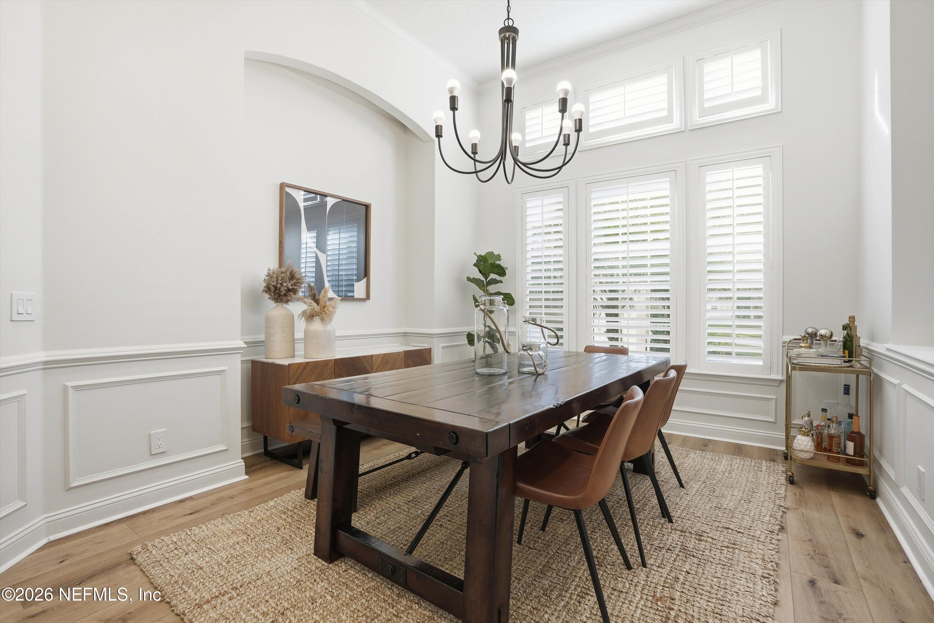 628 Pelham Road St. Augustine, FL 32092 - Photo 5 of 56 a view of a dining room with furniture window and wooden floor