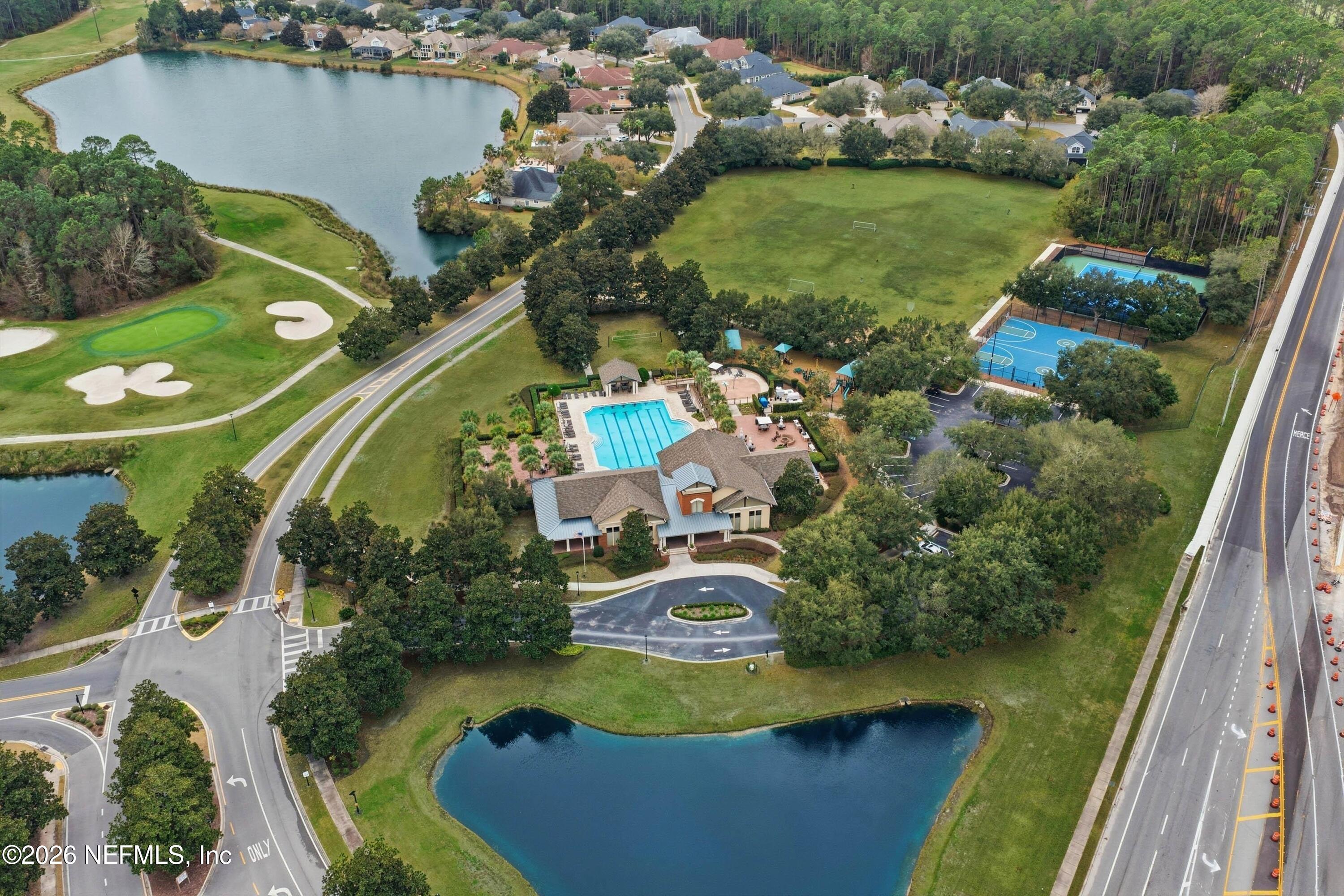 628 Pelham Road St. Augustine, FL 32092 - Photo 56 of 56 an aerial view of a house a yard and a swimming pool