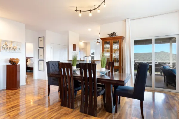 a view of a dining room with furniture window and wooden floor