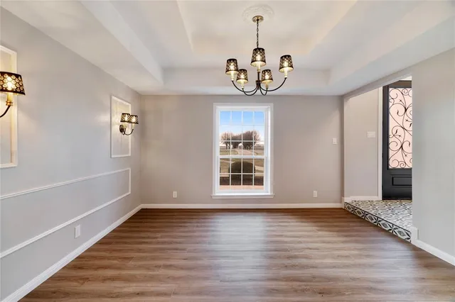 a view of kitchen with a sink dryer and refrigerator