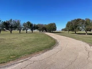 a balcony with an outdoor seating