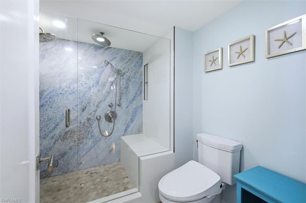 2425 Gulf Of Mexico Drive, Unit 6D Longboat Key, FL 34228 - Photo 29 of 50 Custom granite slab in the shower