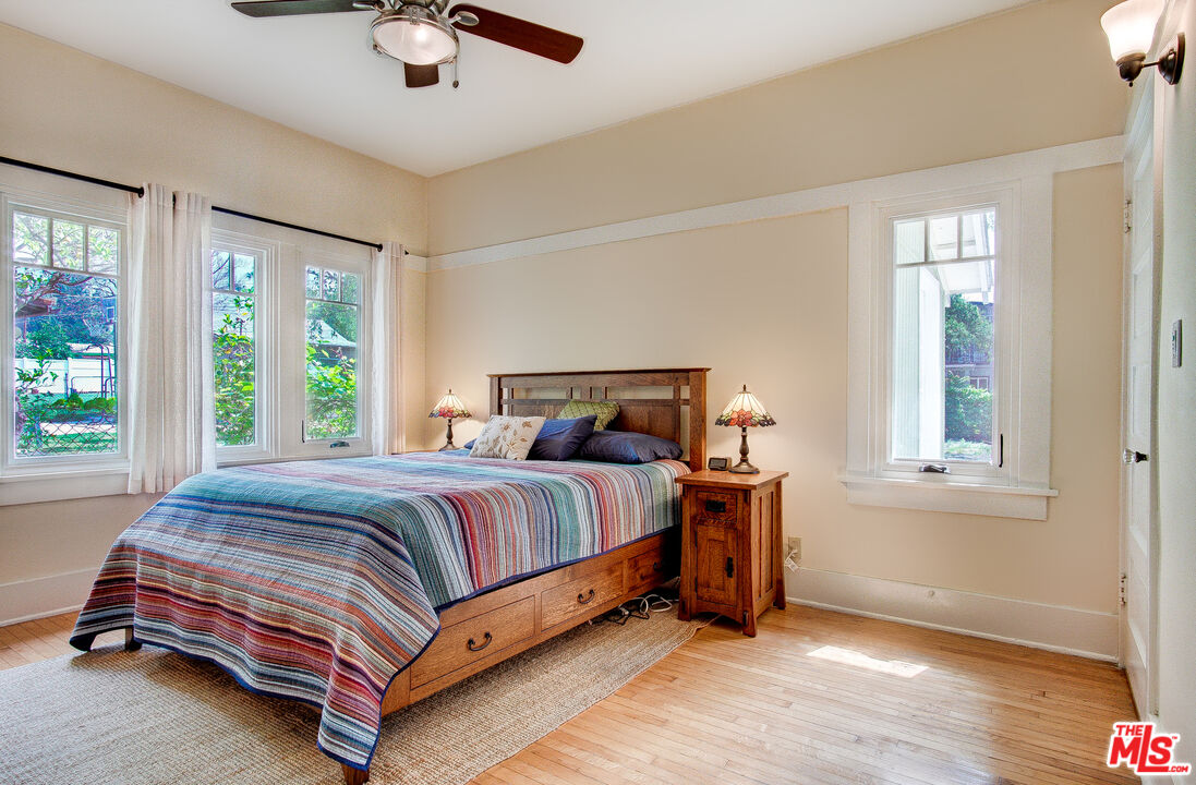 1204 Bresee Avenue Pasadena, CA 91104 - Photo 19 of 31 a bed sitting in a bedroom next to a window