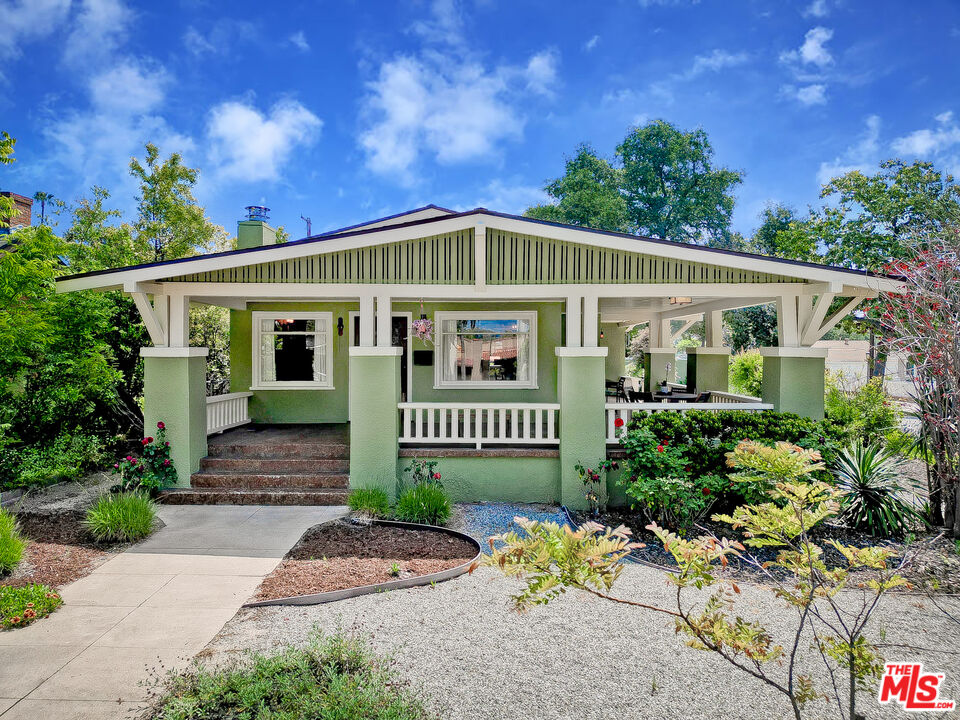 1204 Bresee Avenue Pasadena, CA 91104 - Photo 2 of 31 a front view of a house with garden