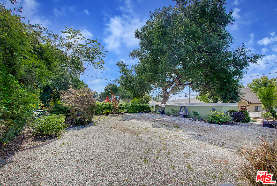 1204 Bresee Avenue Pasadena, CA 91104 - Photo 23 of 31 a view of a dirt road and a building in the background