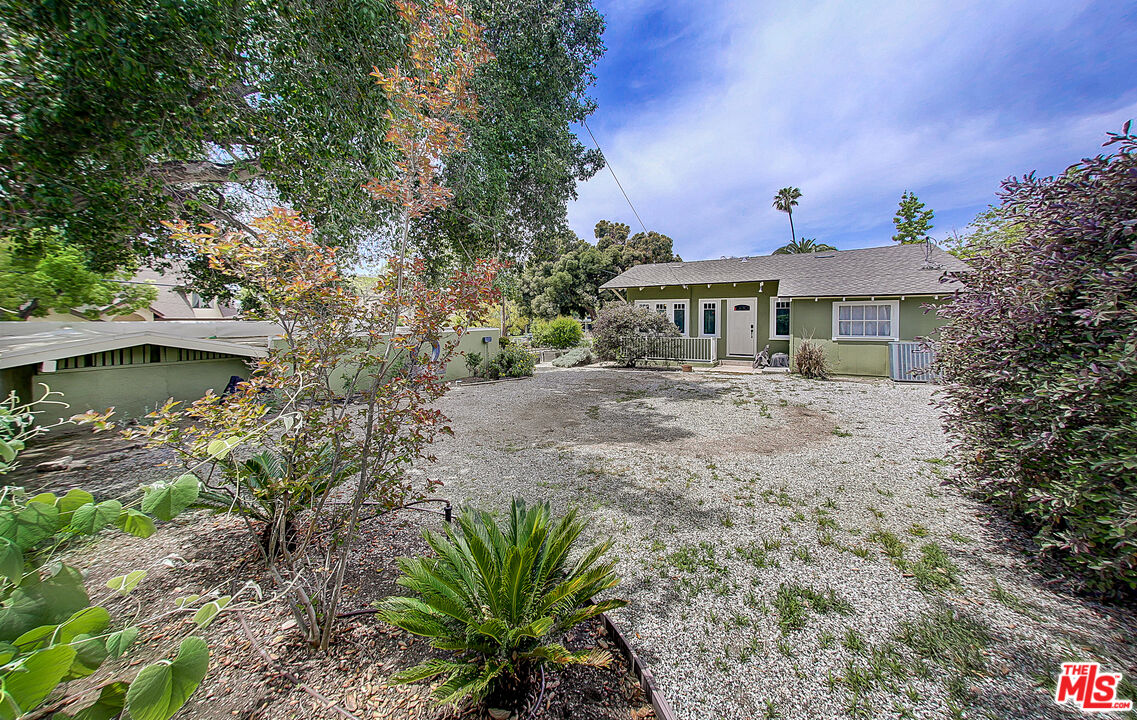1204 Bresee Avenue Pasadena, CA 91104 - Photo 24 of 31 a front view of a house with a yard