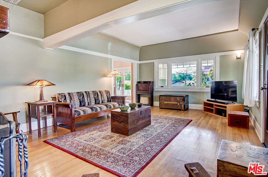 1204 Bresee Avenue Pasadena, CA 91104 - Photo 7 of 31 a living room with furniture and a flat screen tv
