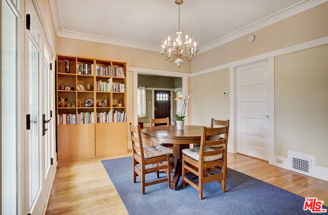 1204 Bresee Avenue Pasadena, CA 91104 - Photo 8 of 31 a view of a dining room with furniture and a chandelier