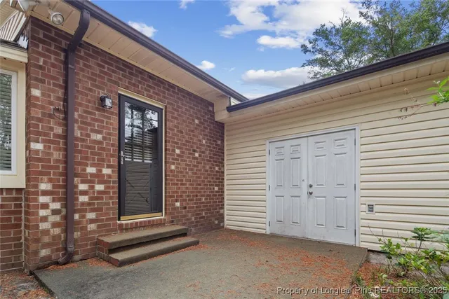 a front view of a house with a garage
