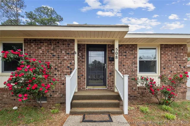 a front view of a house with a porch