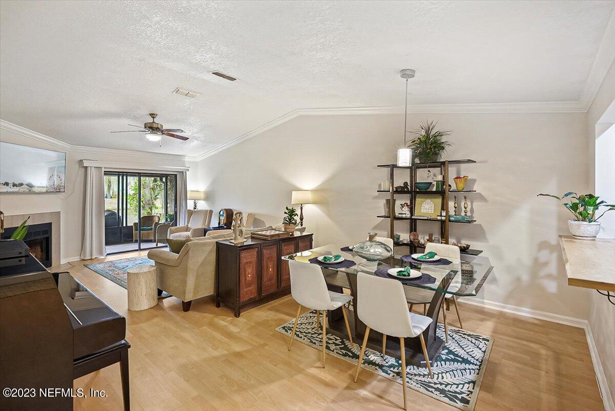 3801 Crown Point Road, Unit 3071 Jacksonville, FL 32257 - Photo 6 of 27 a view of a dining room with furniture
