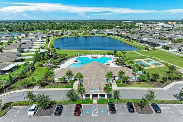 an aerial view of multiple houses with outdoor space