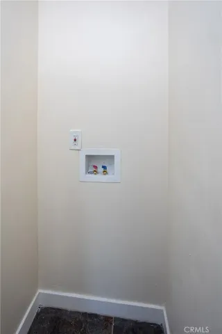 a view of storage and utility room