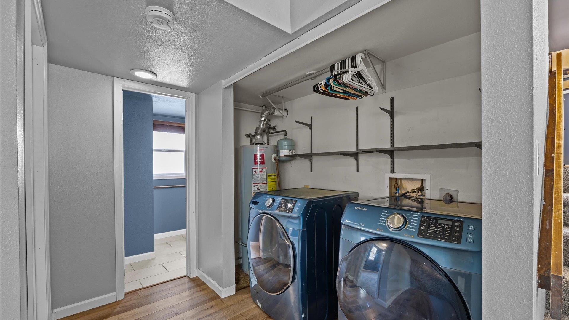 386 Ridge Cir Drive Grand Junction, CO 81507 - Photo 25 of 29 a view of a storage & utility room with closet wooden floor