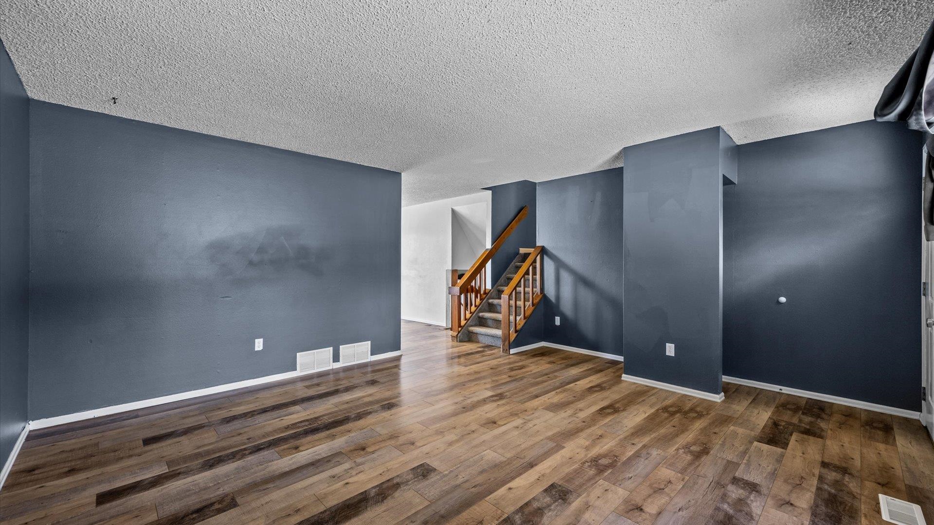 386 Ridge Cir Drive Grand Junction, CO 81507 - Photo 8 of 29 a view of a livingroom with wooden floor