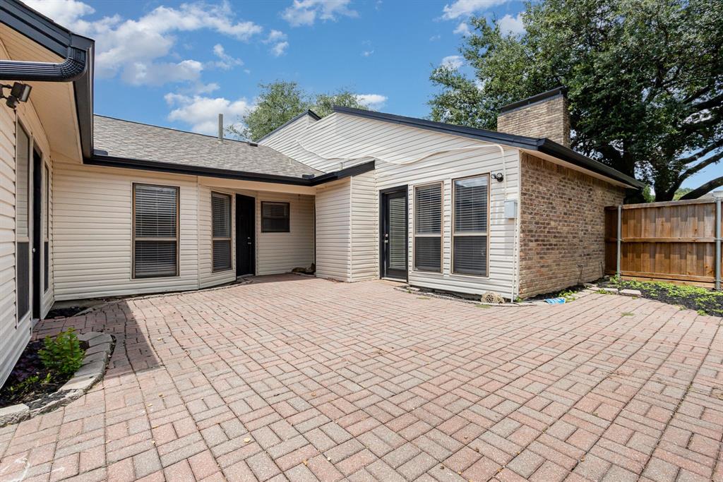 3104 Cross Bend Road Plano, TX 75023 - Photo 24 of 28 a front view of a house with a yard