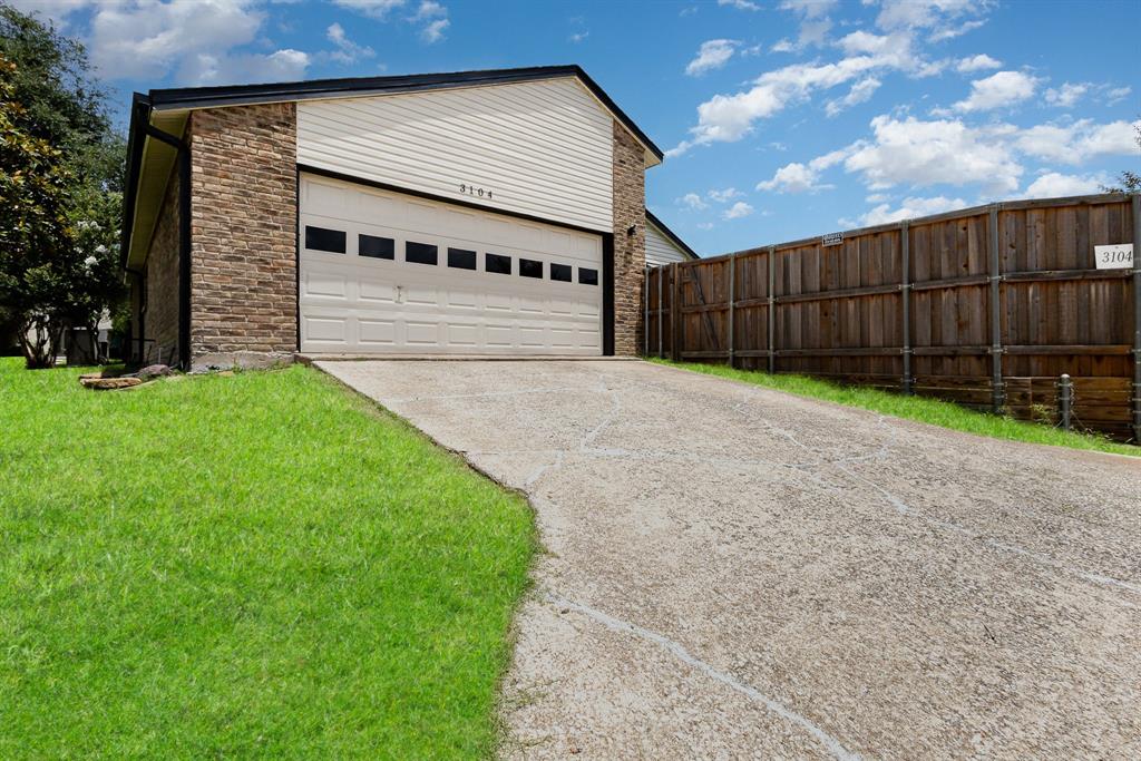 3104 Cross Bend Road Plano, TX 75023 - Photo 27 of 28 a view of a back yard of the house