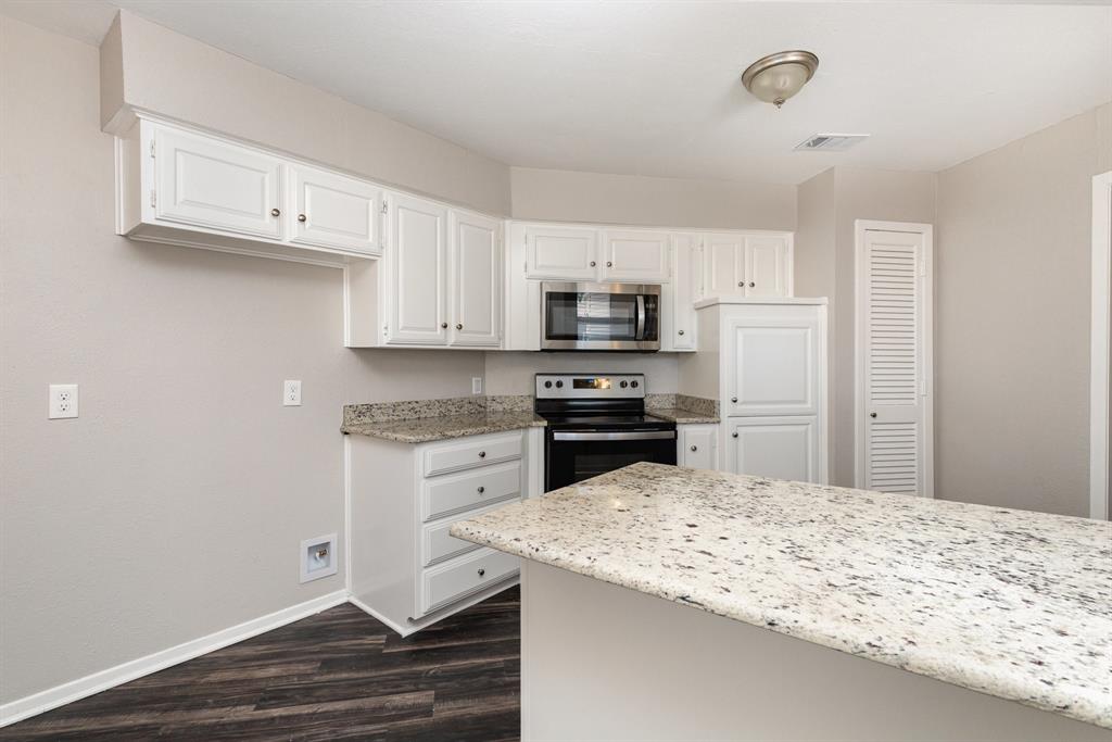 3104 Cross Bend Road Plano, TX 75023 - Photo 10 of 28 a kitchen with granite countertop a sink and cabinets