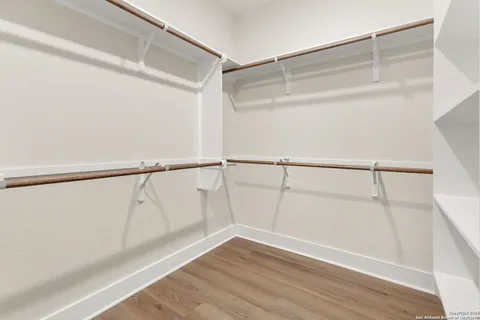 a view of an empty walk in closet