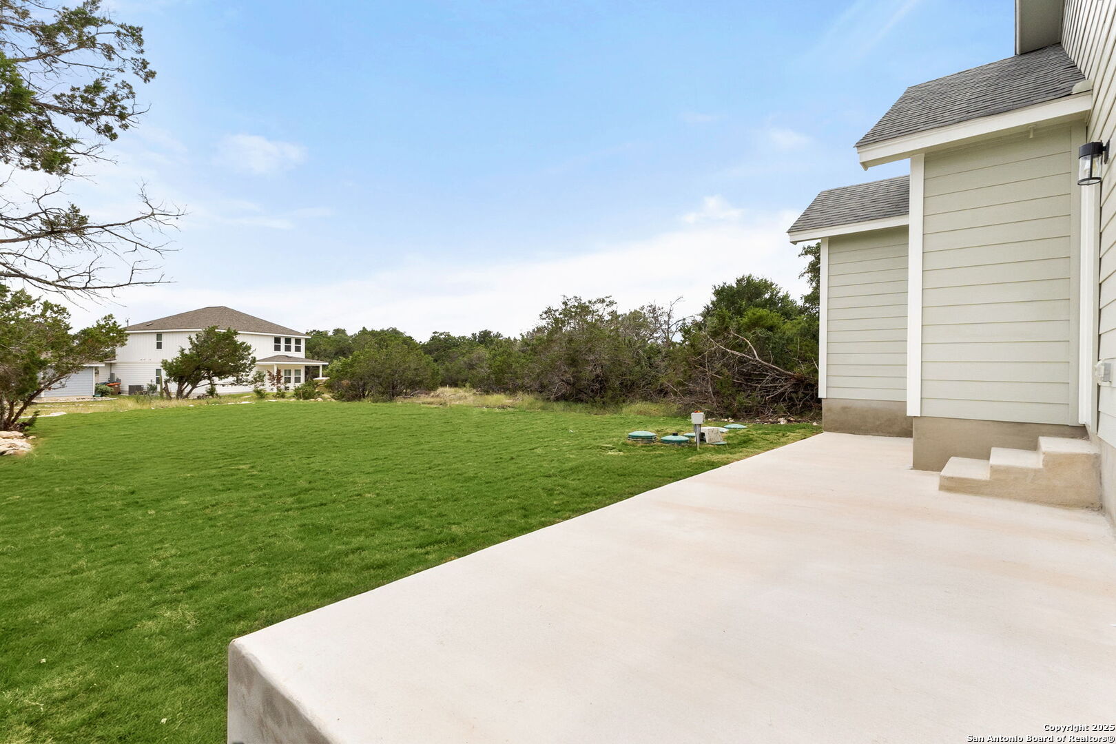 952 Rimrock Cove Spring Branch, TX 78070 - Photo 32 of 39 a view of a backyard with green space