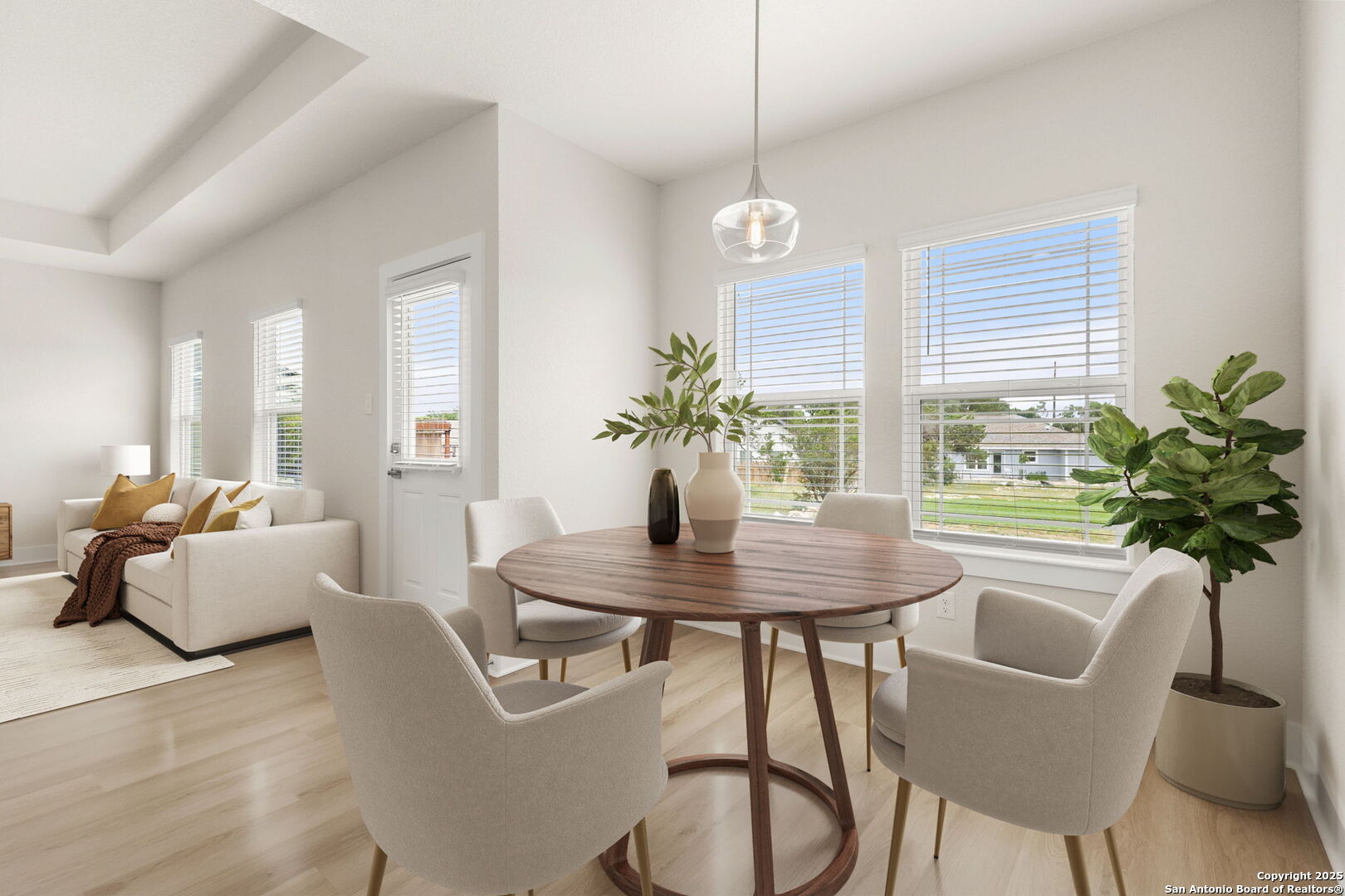 952 Rimrock Cove Spring Branch, TX 78070 - Photo 4 of 39 a view of a dining room with furniture window and wooden floor