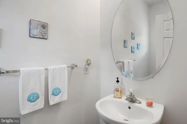a bathroom with a bathtub and a sink