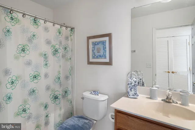 an aerial view of residential houses with outdoor space and swimming pool