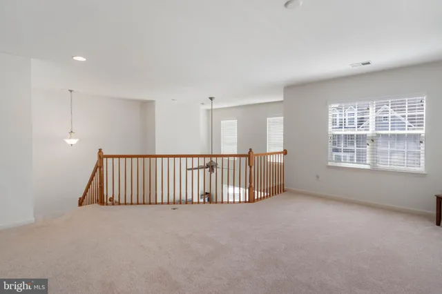 a aerial view of a house with a yard