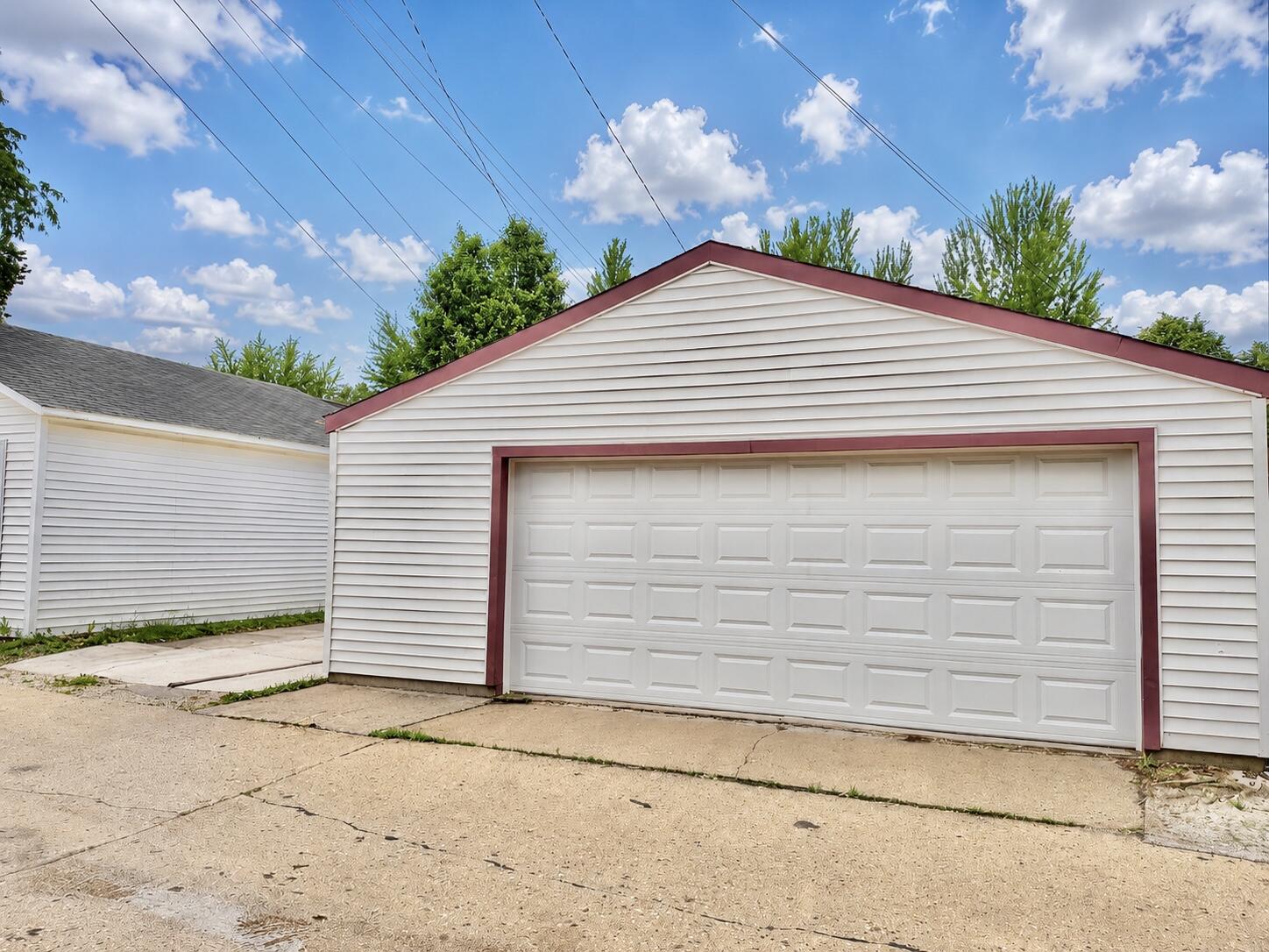 214 South 65th Street Milwaukee, WI 53214 - Photo 21 of 29 Oversized 2.5 car garage plus a parking pad. Some photos may include virtually staging and or digital enhancements.