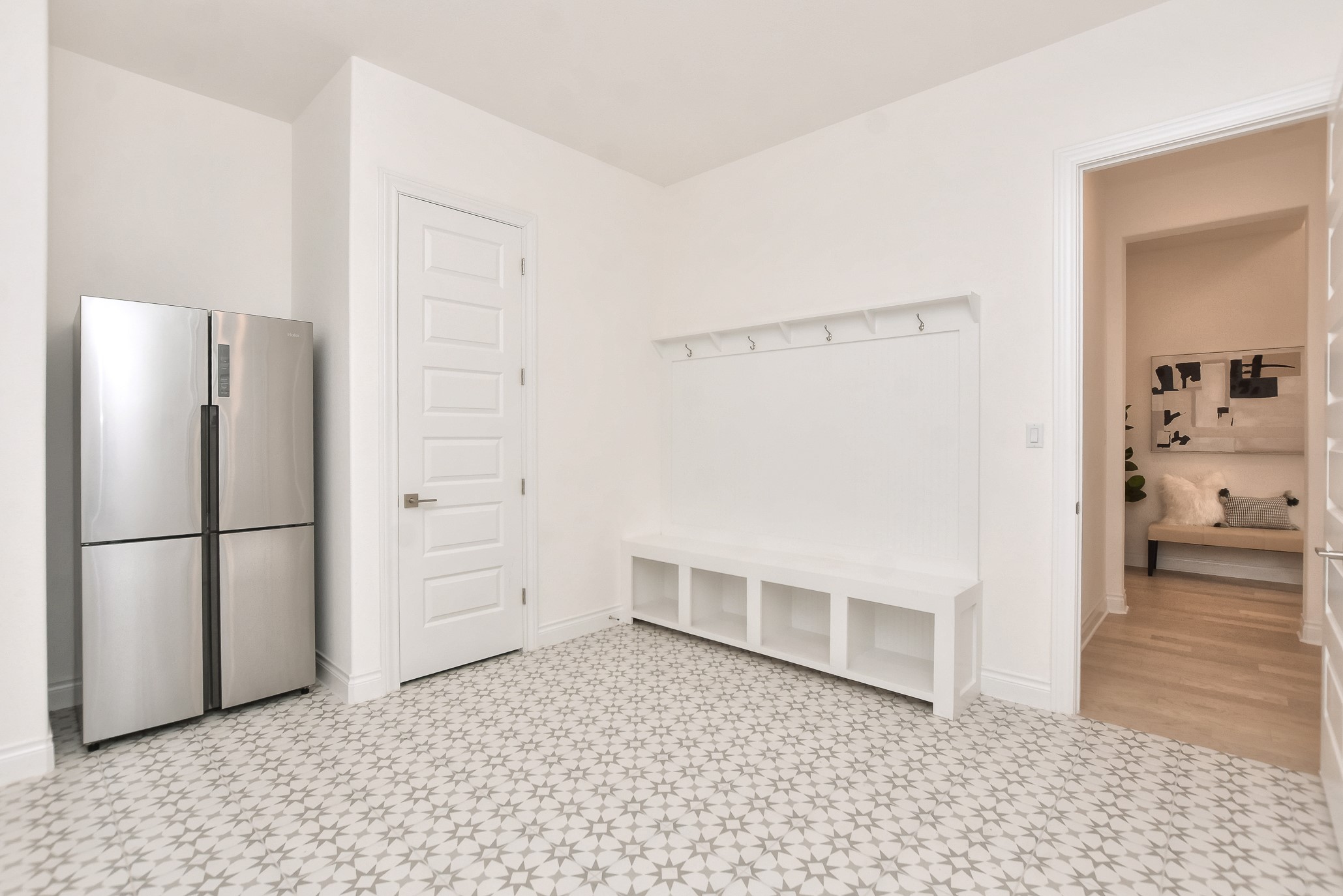 309 Wolf Rdg Road Georgetown, TX 78628 - Photo 20 of 39 Mudroom featuring light floors and baseboards