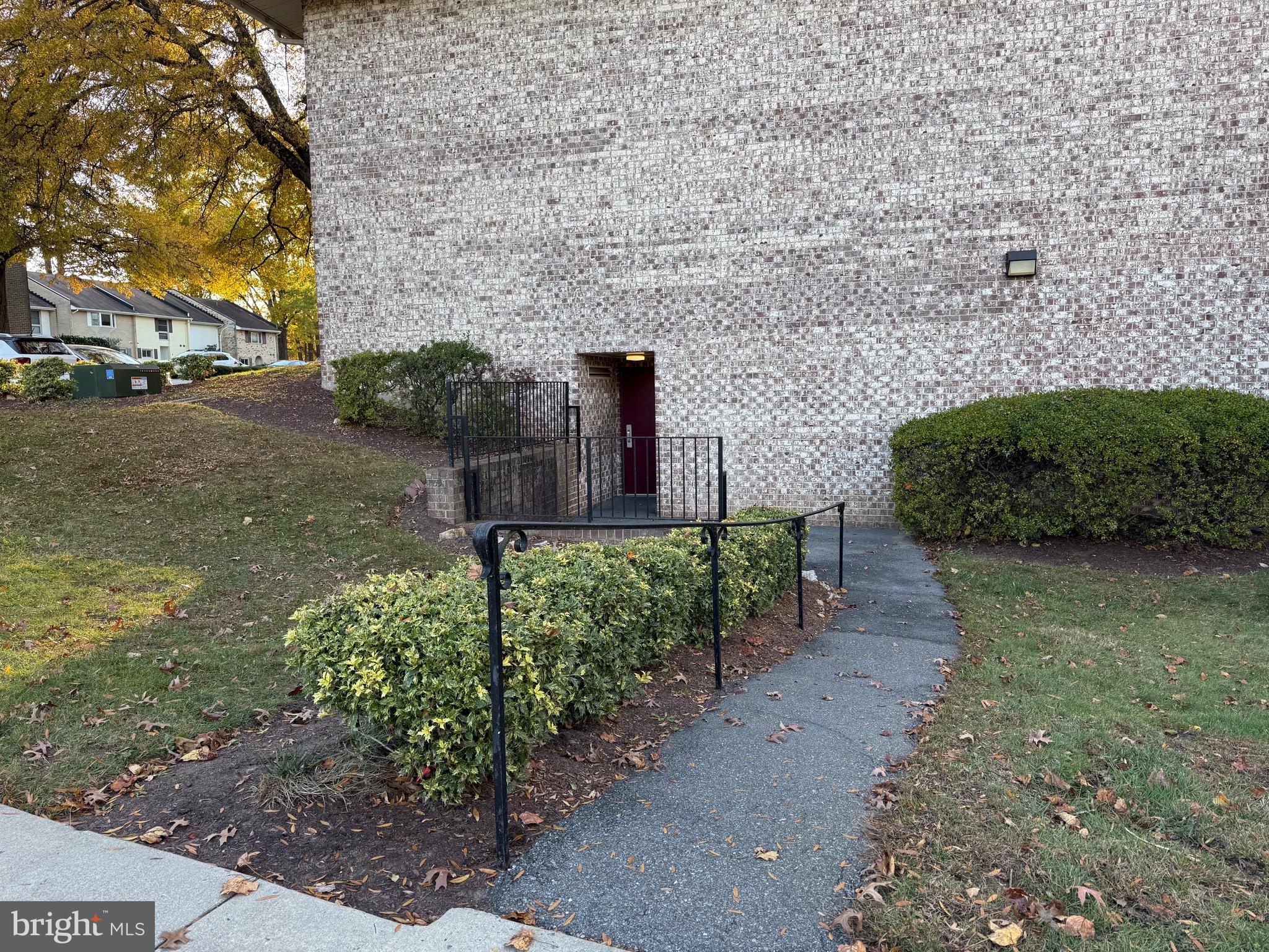 3301 South Leisure World Boulevard, Unit 991H Silver Spring, MD 20906 - Photo 16 of 27 Side entrance without stairs to building and unit