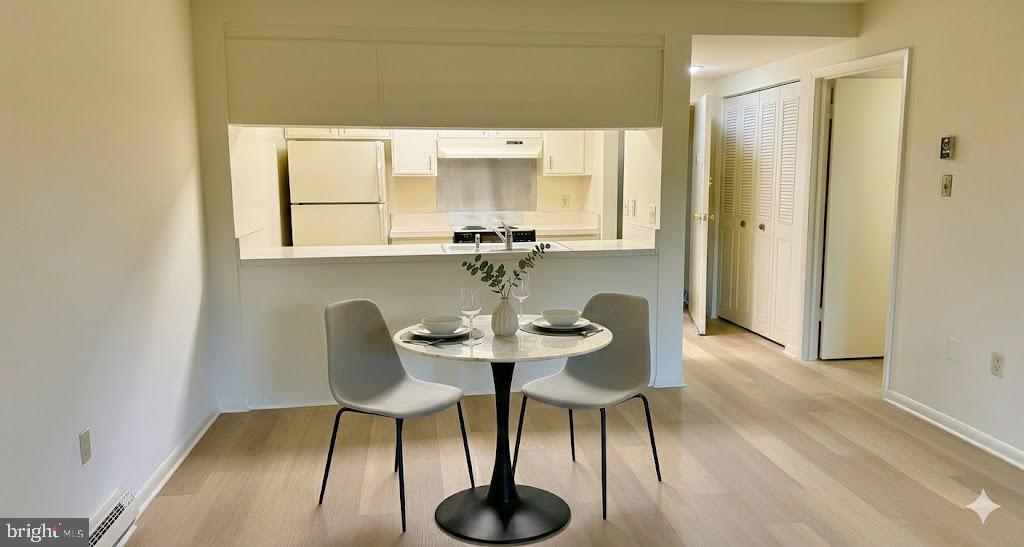 3301 South Leisure World Boulevard, Unit 991H Silver Spring, MD 20906 - Photo 6 of 27 Dining Area-virtually staged