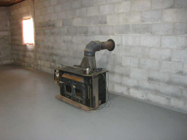 126 Valley Road Cumberland Furnace, TN 37051 - Photo 11 of 14 wood stove in basement
