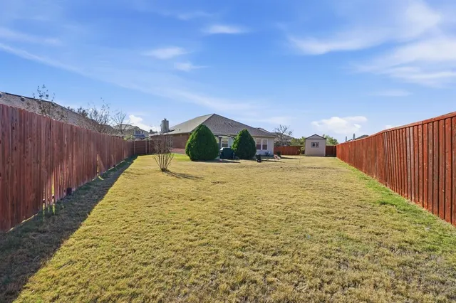 a house view with garden space