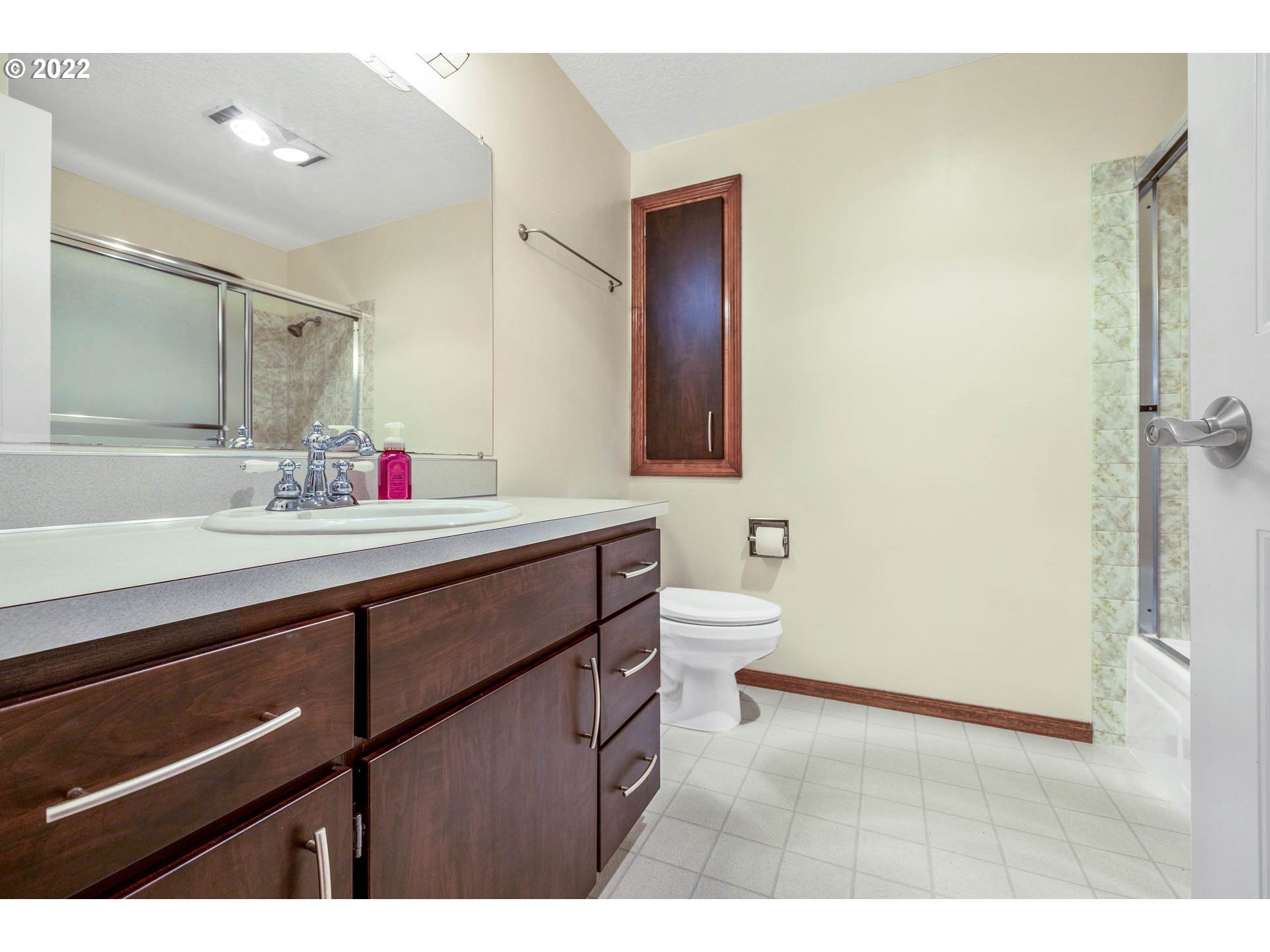 1094 Island Street Springfield, OR 97477 - Photo 17 of 31 a bathroom with a sink and a mirror