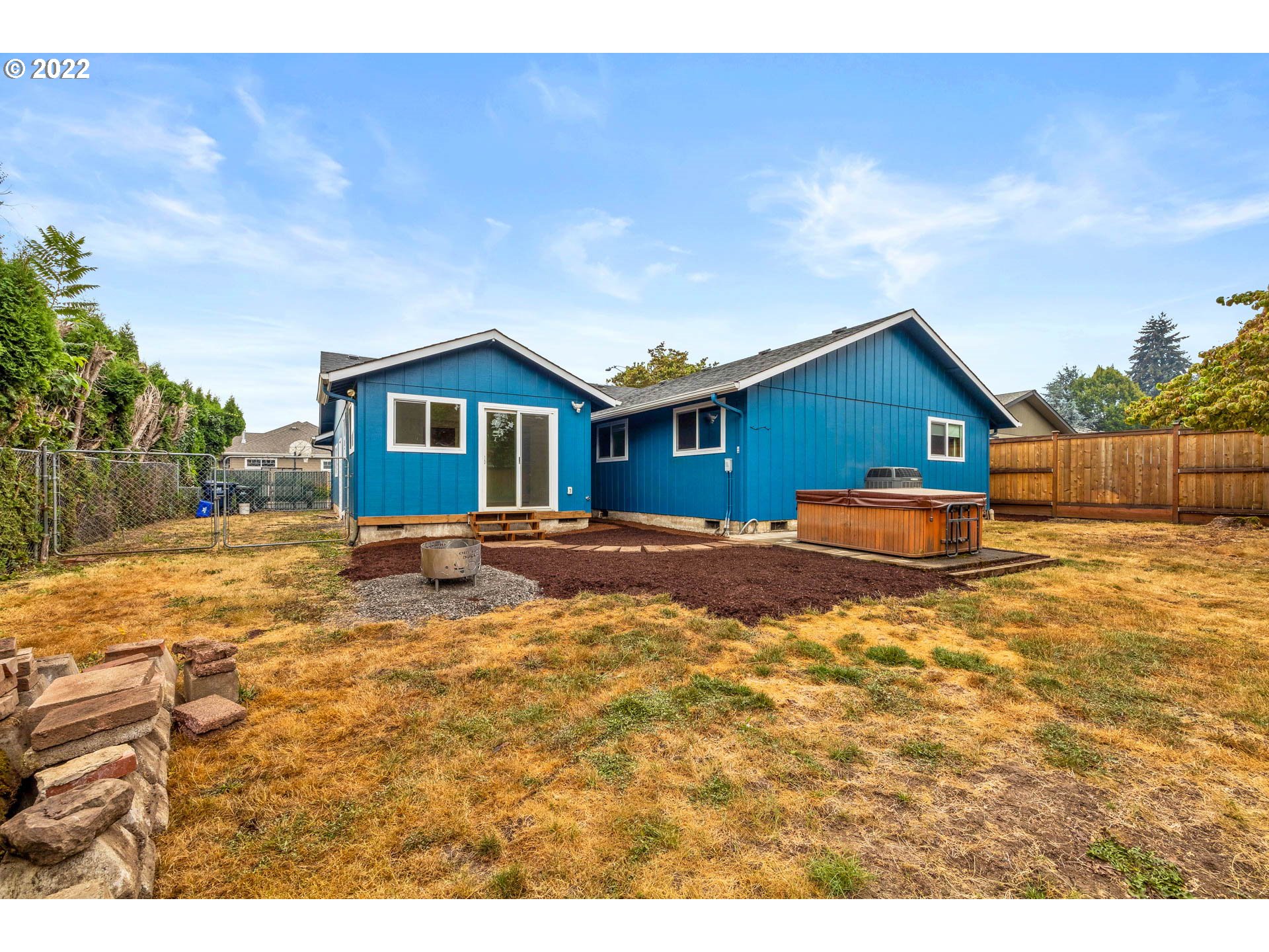 1094 Island Street Springfield, OR 97477 - Photo 30 of 31 a view of house with yard and sitting area