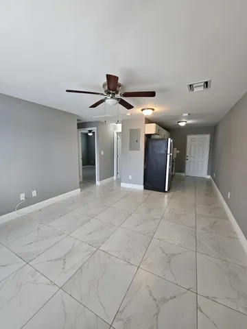 a view of a hallway with a garage
