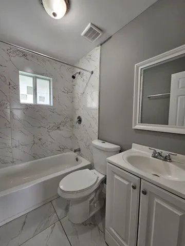 a bathroom with a bathtub