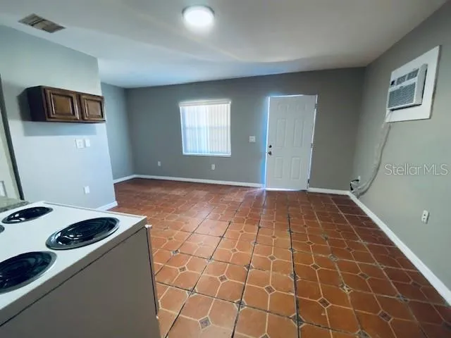 a view of a livingroom with furniture and storage