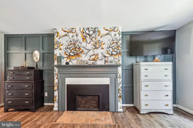 a view of room with cabinets and fireplace