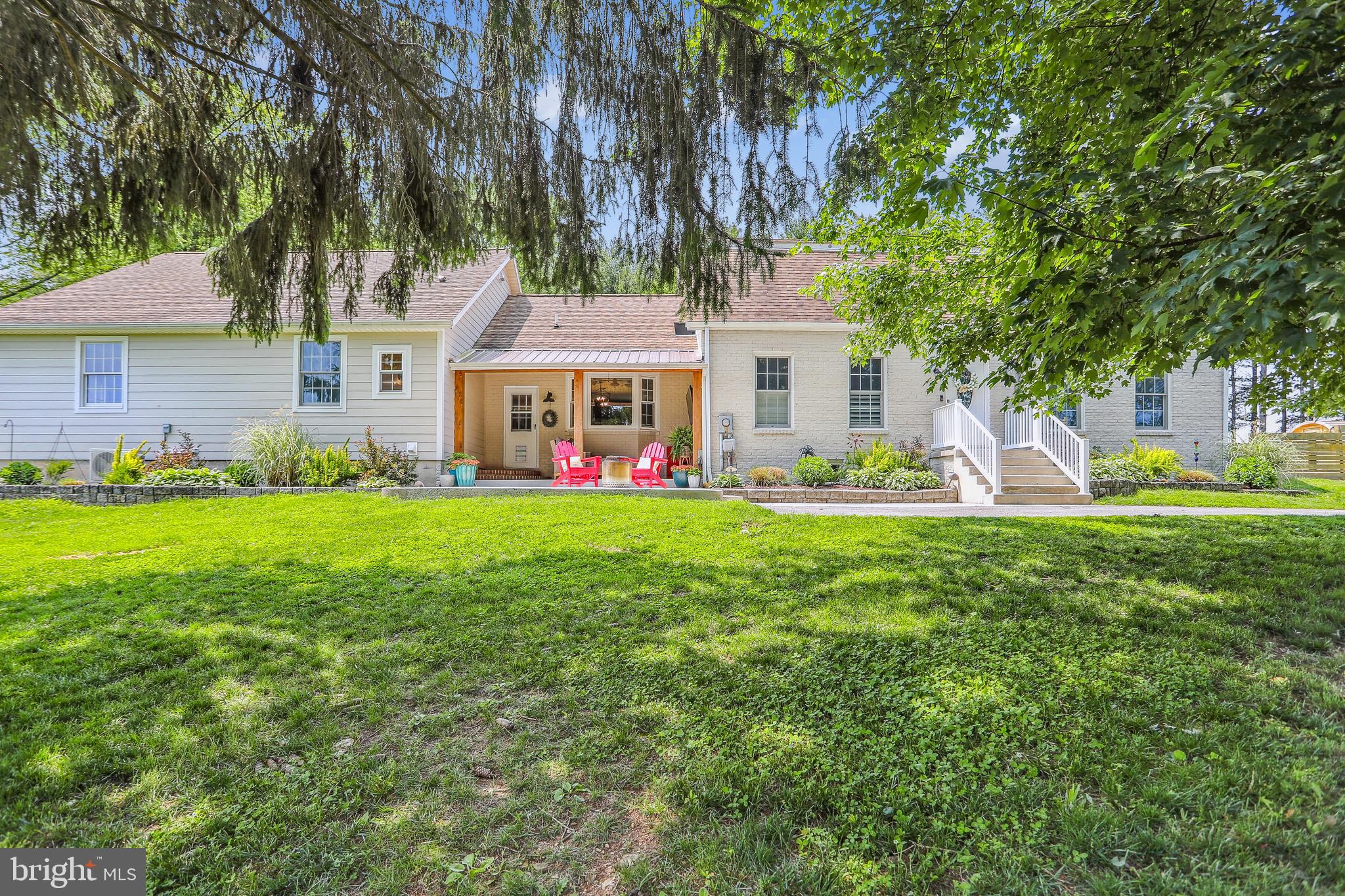8730 Mapleville Road Union Bridge, MD 21791 - Photo 2 of 50 a front view of house with yard and green space