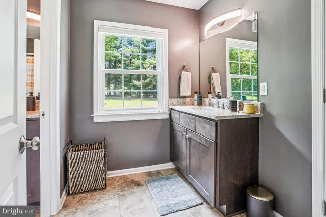 a kitchen with a sink and a window