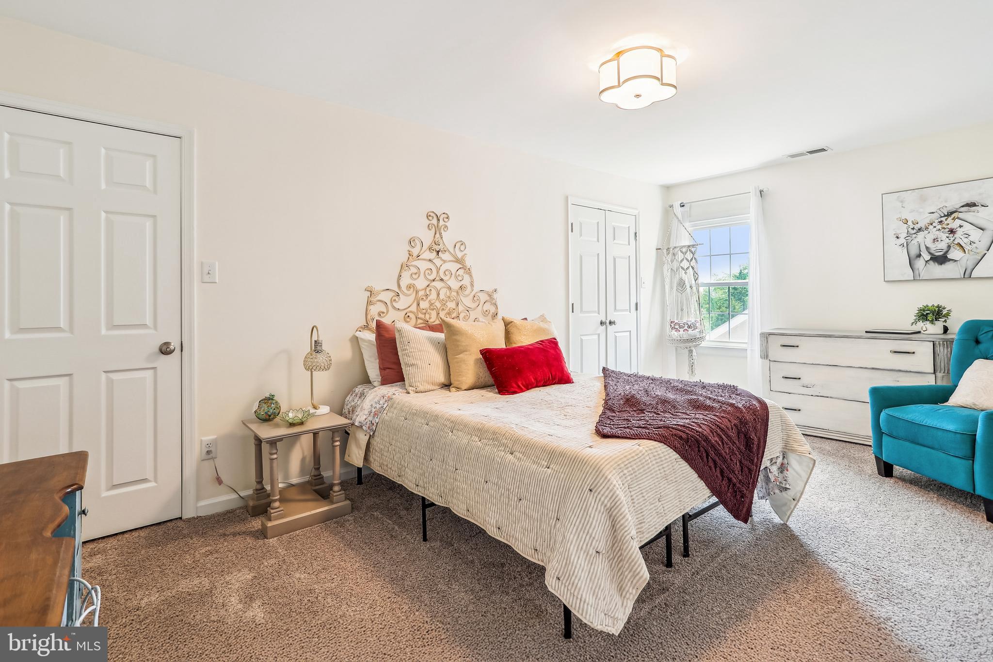 8730 Mapleville Road Union Bridge, MD 21791 - Photo 28 of 50 a bedroom with a bed and a couch