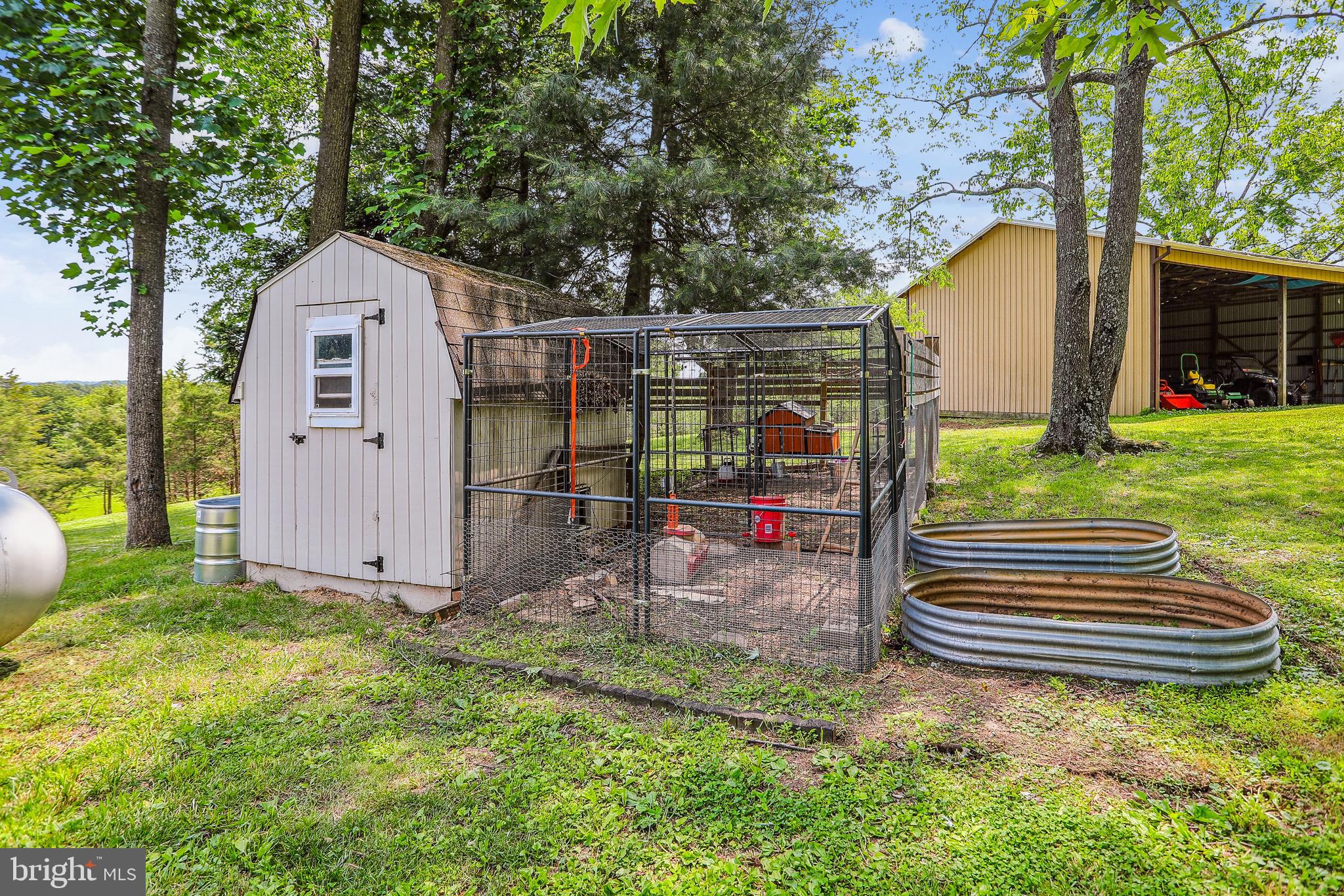 8730 Mapleville Road Union Bridge, MD 21791 - Photo 43 of 50 a front view of a house with garden