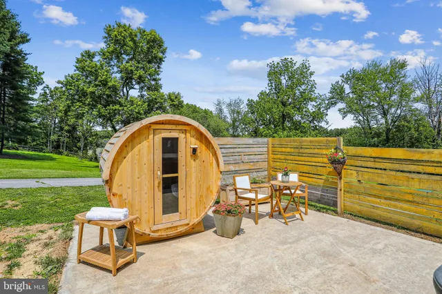 a view of a swimming pool with a lounge chair