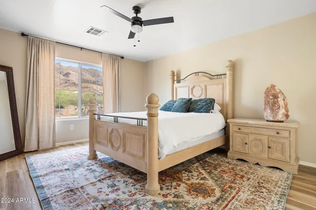 a bed room with a bed and a window