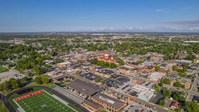 an aerial view of residential houses with outdoor space