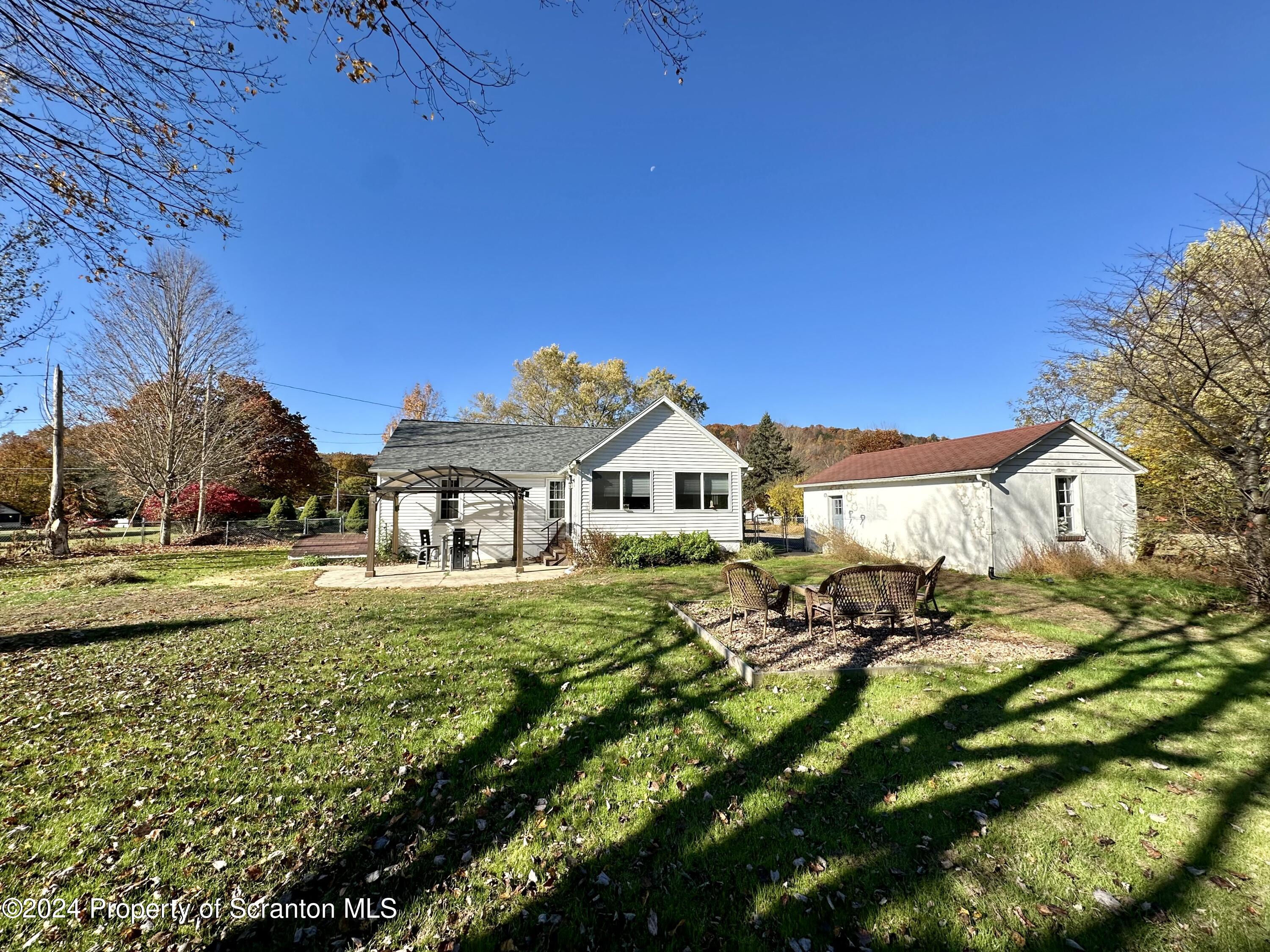 4 East Lemon Road Tunkhannock, PA 18657 - Photo 18 of 25 a front view of a house with a yard